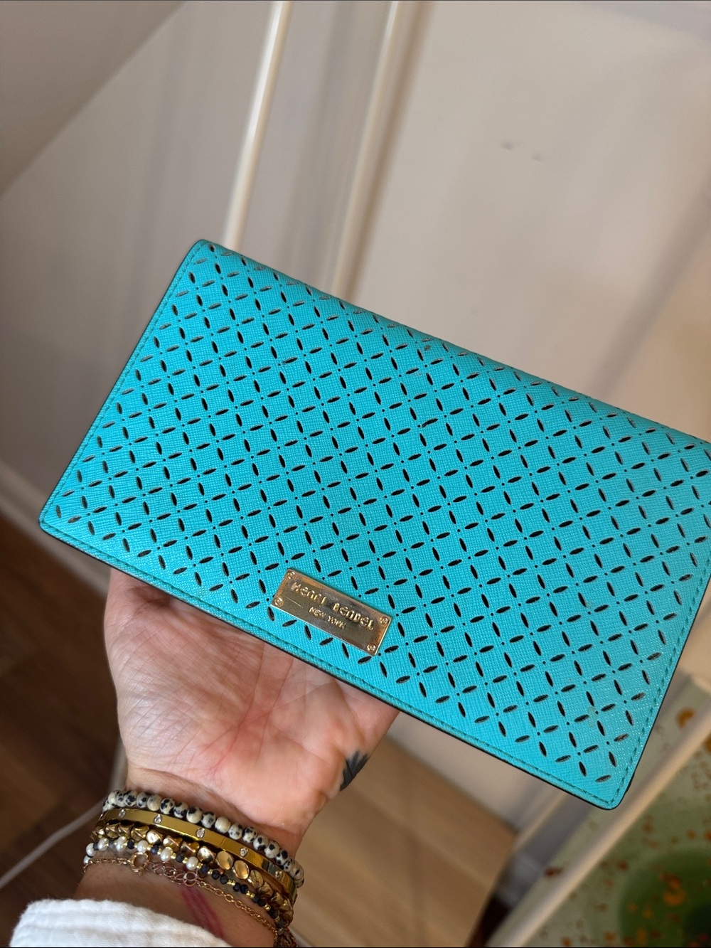 Henri Bendel Turquoise Perforated Leather Passport Wallet with Gold Plaque